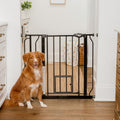 Carlson 29.5–36.5” Extra Wide Dog Gate with Small Pet Door, Walk-Through Pressure Mounted Metal Indoor Pet Safety Gate, Black, Tested and Trusted by Pet Parents, American Designed, American Owned