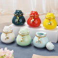 SOITIS Pet Memorial Urn for Cat or Dog Ashes - 3.54"x3.15" Elegant Ceramic Keepsake Holder with Pet-Shaped Lid & Gold Tr